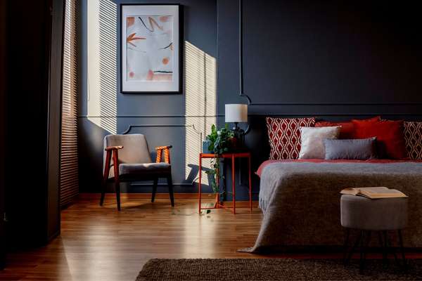 Be bold with dark grey bedroom walls 